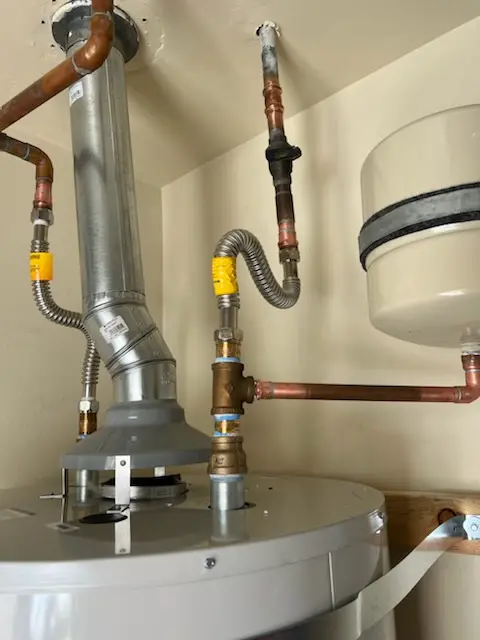 Water heater installation and plumbing repair in Helmetta
